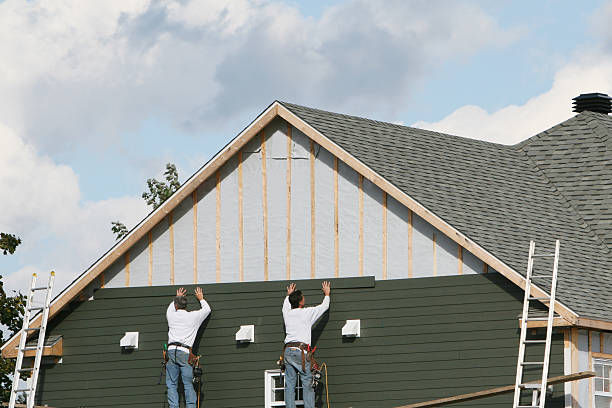 Professional Siding technician working in Sedley, VA